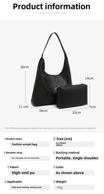 Black retro large-capacity tote with a single shoulder strap and matching zip pouch.